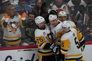 Malkin gets 2 goals in his return from suspension as the Penguins beat the NHL-leading Avalanche 7-2
