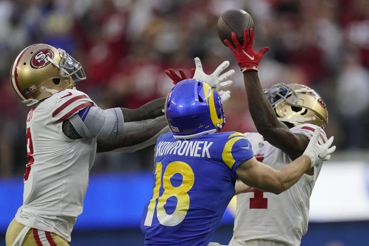 49ers clinch playoff berth by holding off Rams 27-24 in OT