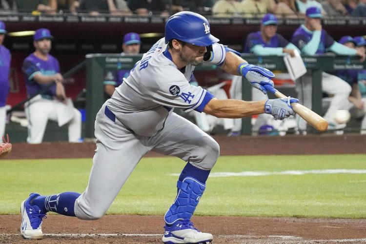 Chris Taylor released by Dodgers, who owe him $13.4 million