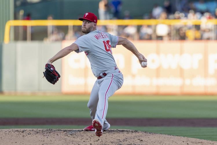 Turner homers, Wheeler strong again and Phillies beat Athletics 4-3 for 8th straight win