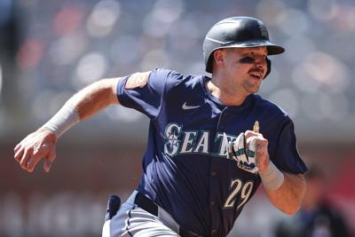 Raliegh hits major league-leading 53rd homer, Mariners rout Braves 18-2 with most runs since 2012
