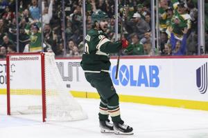 Wild clinch playoff spot by taking Ducks to OT on Eriksson Ek's tying goal with 20.9 seconds left