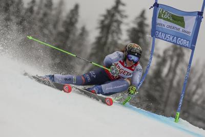 Slovakian skier Vlhova leads rain-marred World Cup GS after 1st run. Shiffrin 0.98 behind in 7th