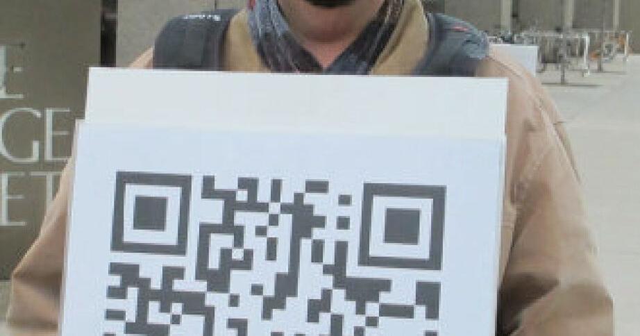Scan this! A walking QR Code who has something to say