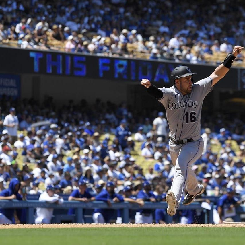 Julio Urías strikes out 12 while the Dodgers rout the Rockies 8-3