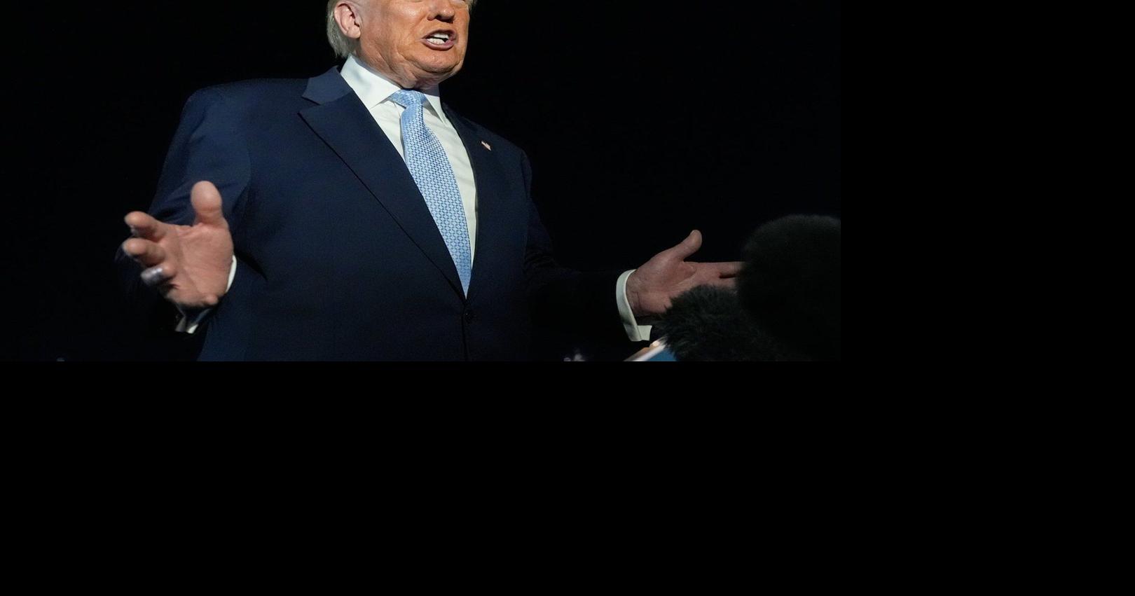 Trump defends Tucker Carlson after interview with activist known for his antisemitic views