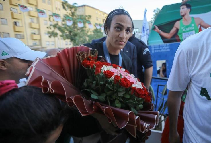 Gold medal boxer Imane Khelif hailed upon return to Algeria