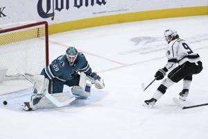 Akil Thomas scores 1st NHL goal as Kings beat Sharks 2-1 to improve playoff position