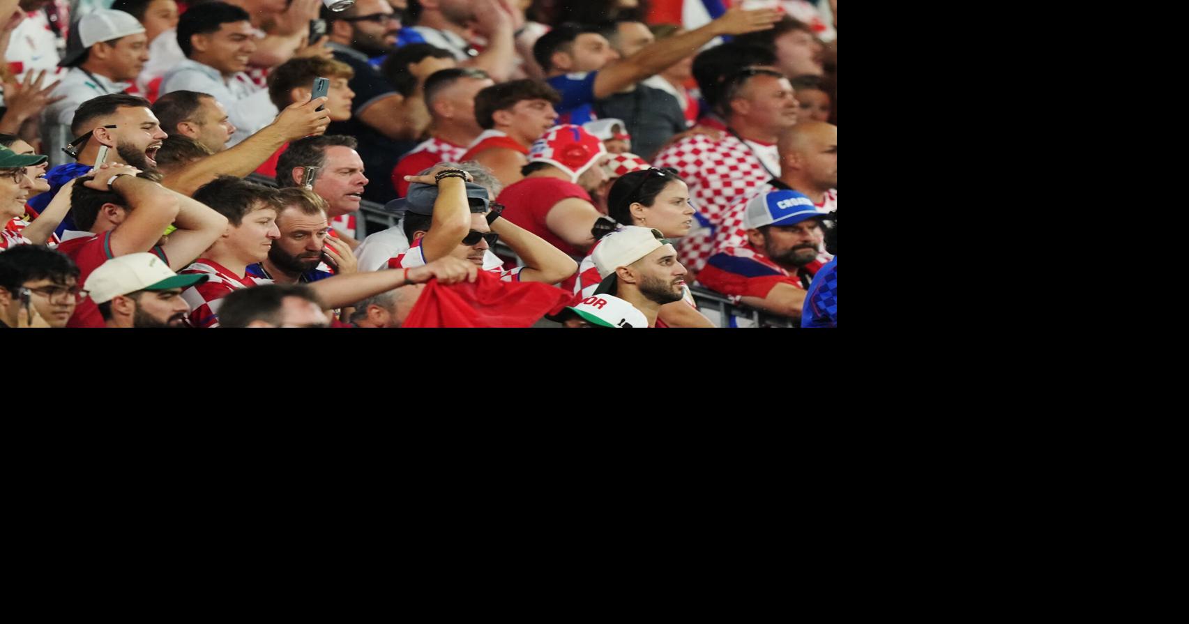 ‘I’m proud of our team’: Croatian fans deal with heartbreaking loss