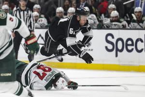 Anze Kopitar scores his 1,200th point while leading the Kings' 6-0 thrashing of the Wild