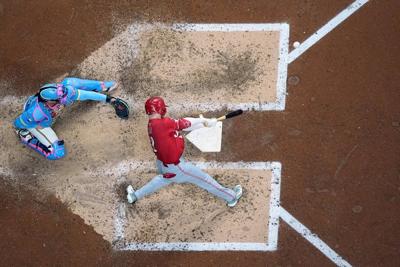 Reds overtake Mets for NL's 3rd wild-card spot by beating Brewers 3-1