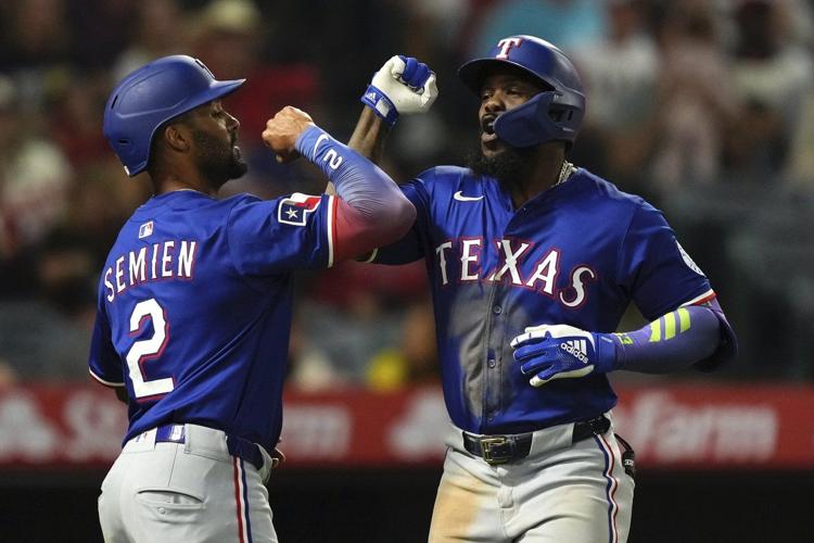 Semien and Seager propel Rangers to 11-4 blowout of Angels