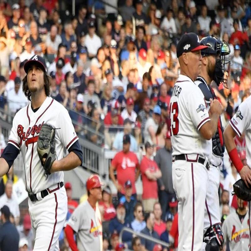 McCann's bases-loaded walk lifts Braves past Cardinals in 10