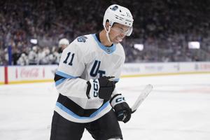 Dylan Guenther scores twice, Utah outlasts Islanders 5-4 in OT to improve to 2-0