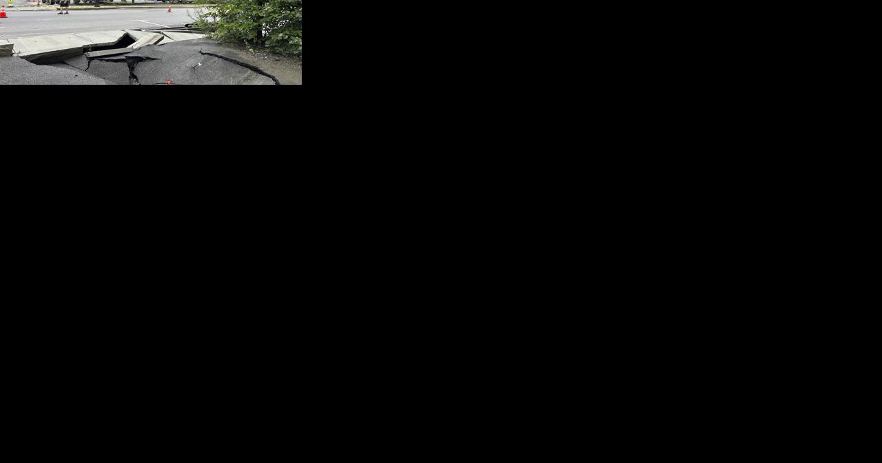 New England getting more rain watching Hurricane Lees path after flooding sinkholes