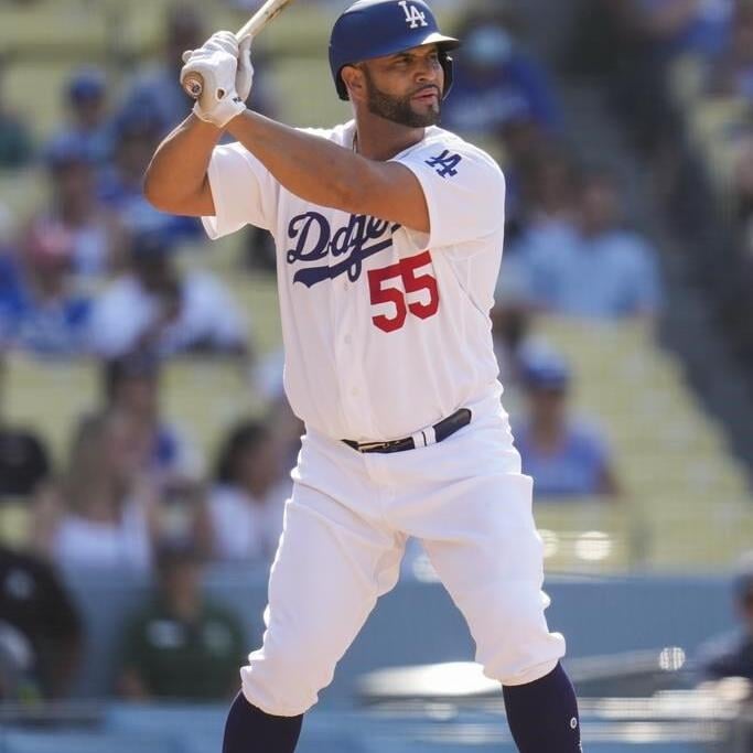 Injury-plagued Dodgers keeping close in bid to repeat title