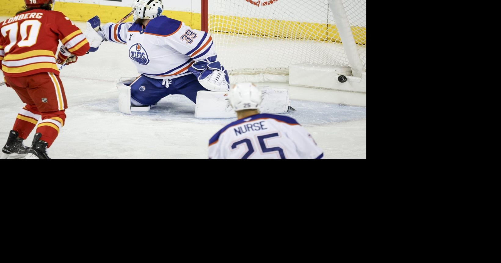 Flames remain hot at home, burn Oilers 3-2