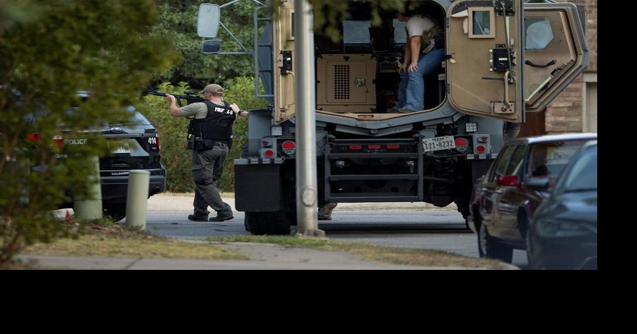 Hostage suspect surrenders after 3 officers hurt in shootout