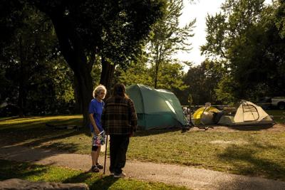 As city looks to clear encampment in park, residents demand permanent housing