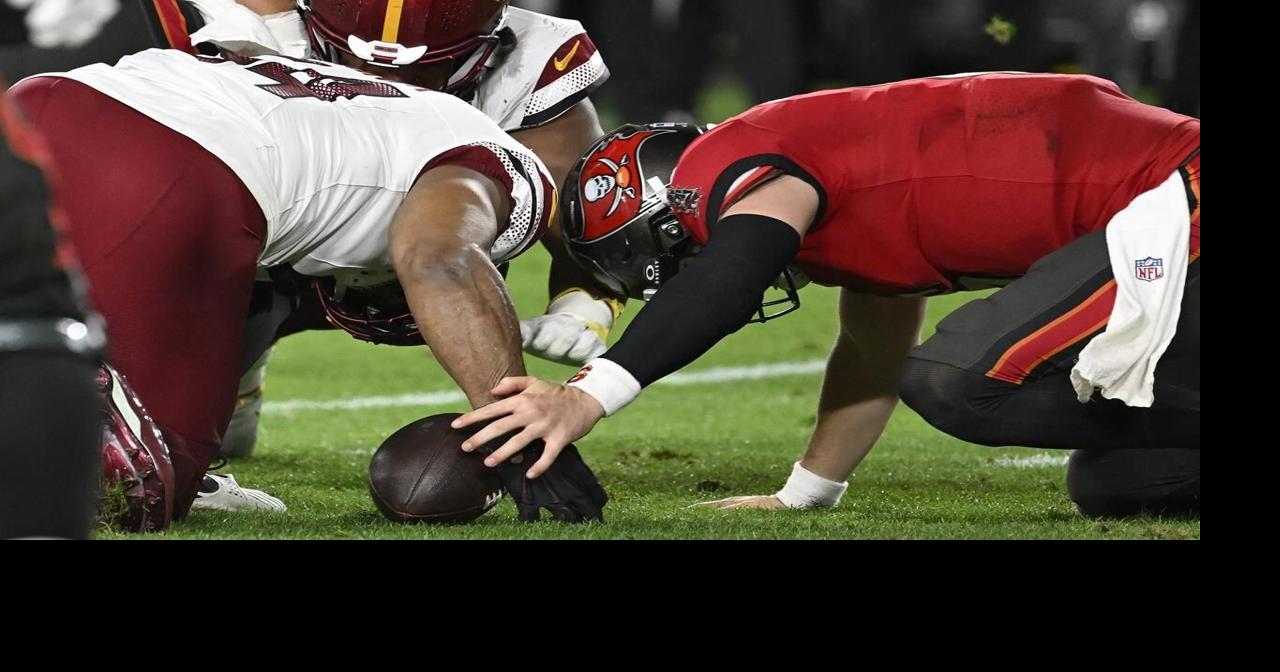 Botched handoff by Baker Mayfield and late failures by Bucs' offense contribute to playoff loss
