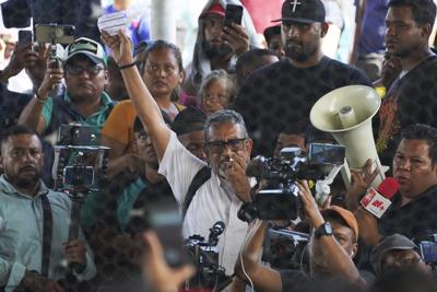 Mexican authorities arrest outspoken activist ahead of a planned migrant caravan