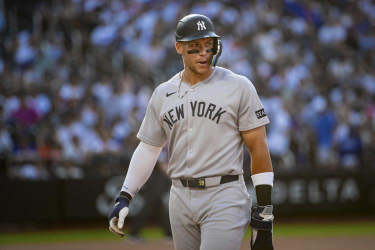 Aaron Judge gets struck in the face by a toss from Yankees teammate Anthony Volpe