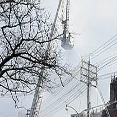 Four-alarm fire on Queen Street West leaves firefighter injured