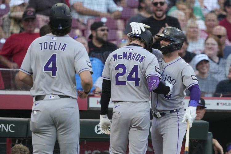 Rockies score winning run on wild pitch, snap a 3-game skid with a 3-2 victory over the Reds