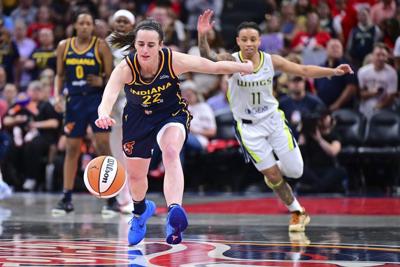 Clark, Fever get best of Bueckers, Wings in first pro matchup of WNBA stars