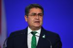 Former President Juan Orlando Hernández returns to Honduras after arrest warrant suspended
