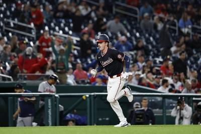 Rosario's pinch-hit single in 10th lifts Nationals to 8-7 win over Braves