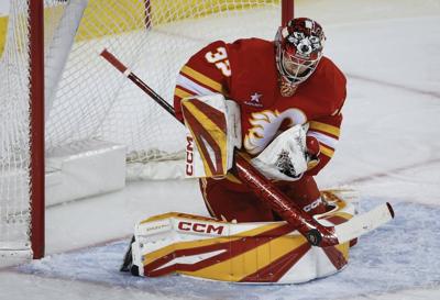 Flames sign goalie Dustin Wolf to seven-year, US$52.5-million contract extension