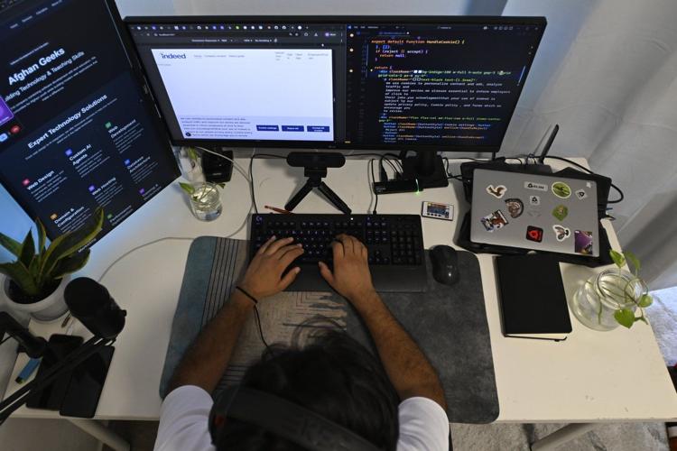 Afghan women turn to online courses as the Taliban bans education