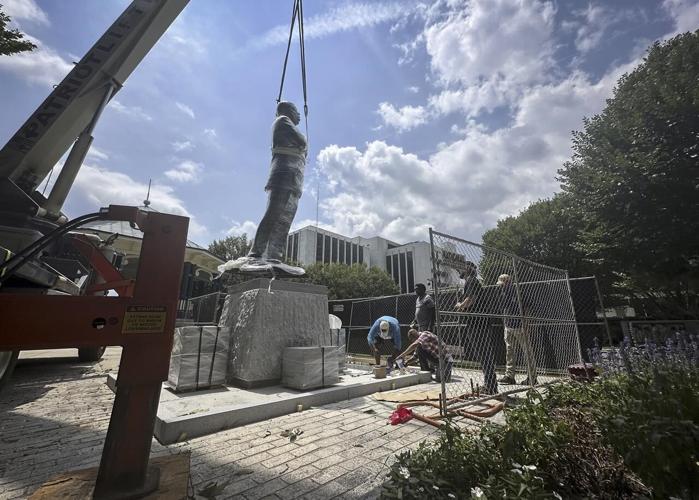 Bronze statue of John Lewis replaces more than 100-year-old Confederate monument
