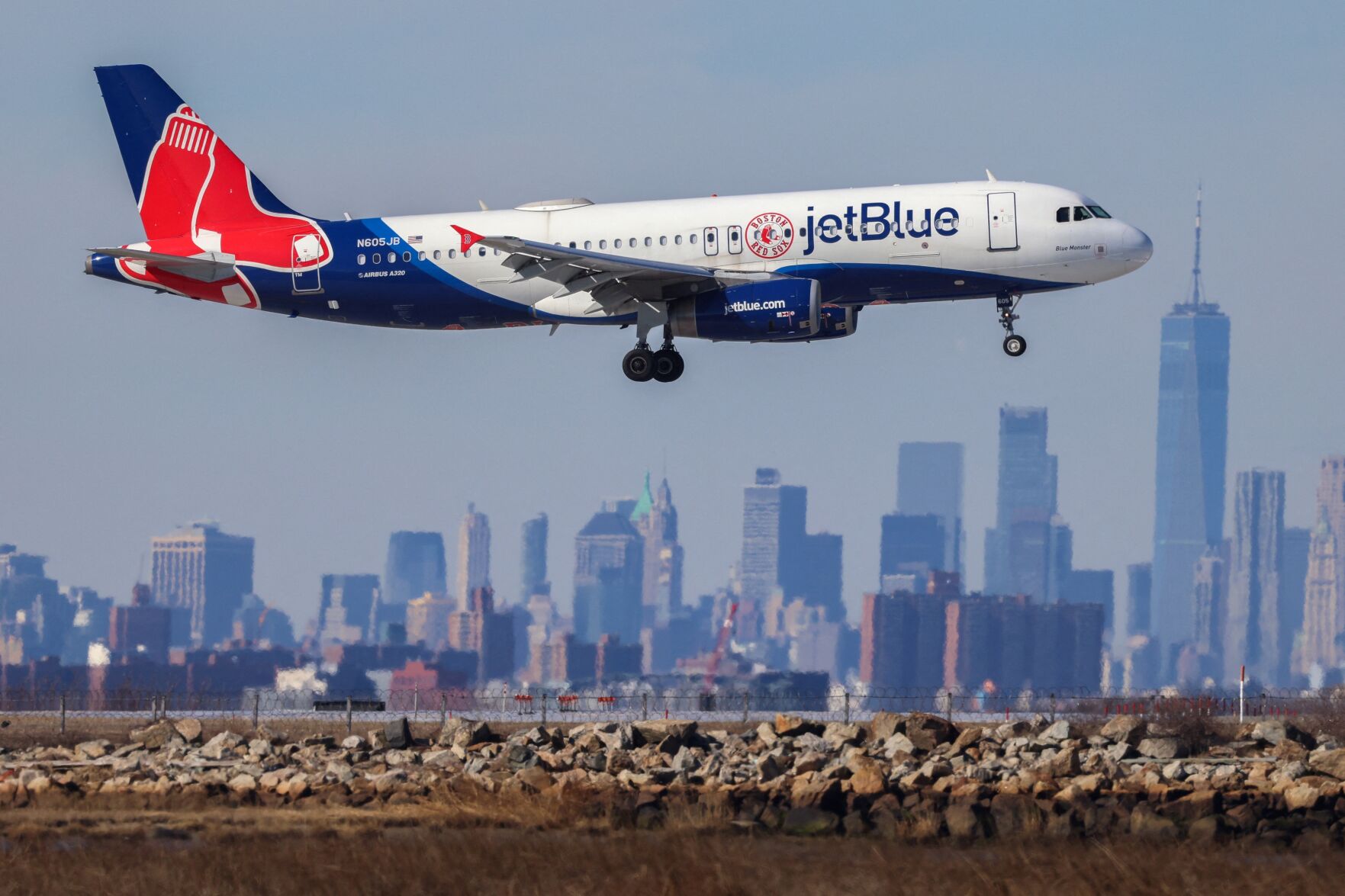 Two JetBlue planes make contact at Logan Airport wingtip touches tail