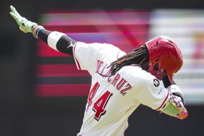 Reds hit 3 home runs, Martinez throws 7 shutout innings to snap 3-game skid, beat White Sox 7-1