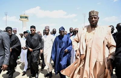 Former Nigerian president Buhari is buried as thousands pay respects