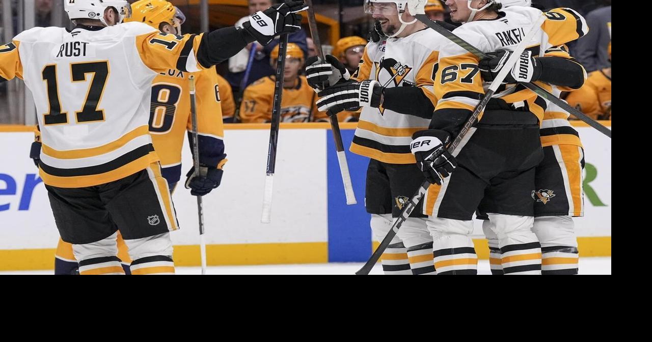 Rust scores in overtime, Crosby has 4 points in Penguins' 5-4 win over Predators