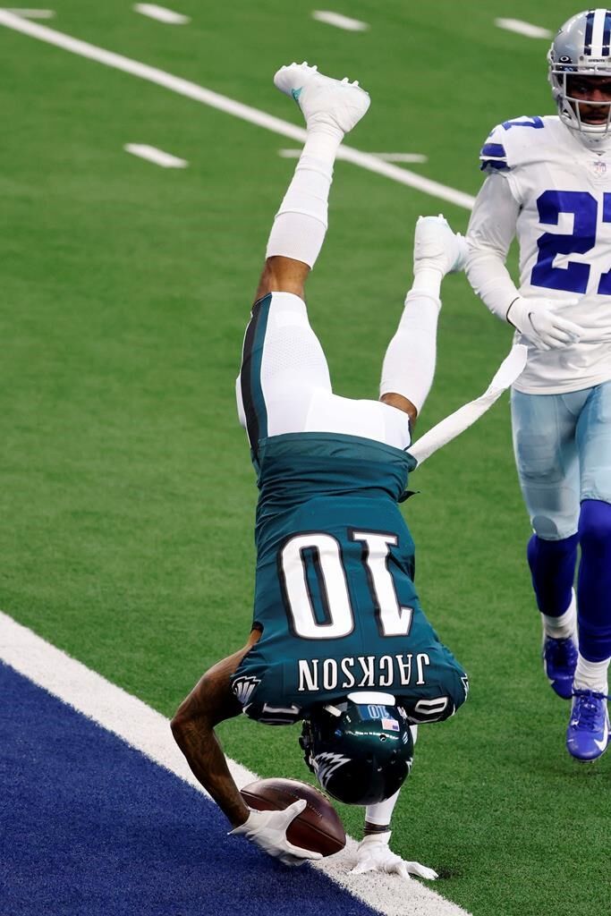 Cowboys soar past Eagles 37-17, somehow still alive for playoff spot