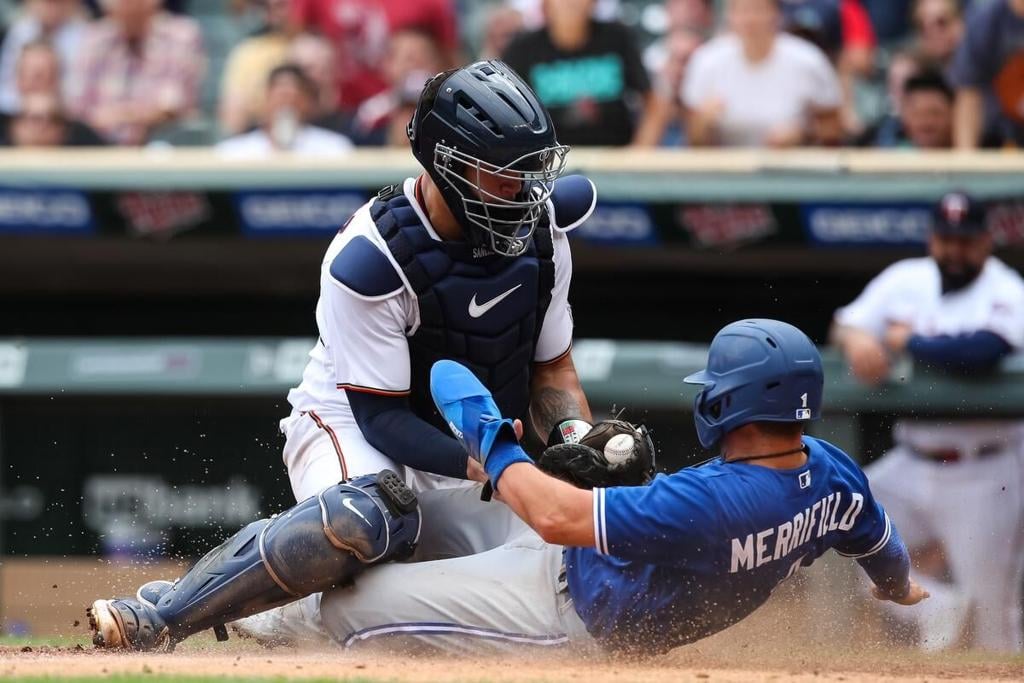 Today in Jays history: Buck Martinez run over at the plate