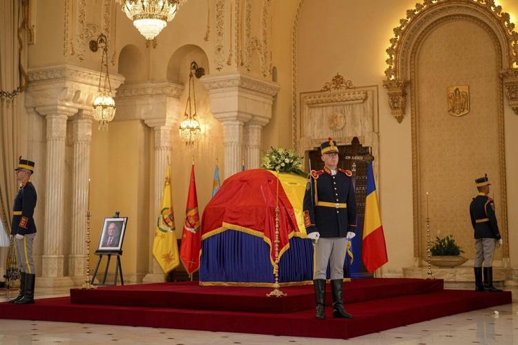 Ion Iliescu's death exposes Romania's deep divisions over his legacy as former leader laid to rest