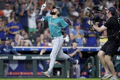 Crawford's grand slam and Raleigh's 58th homer lead Mariners to sweep over Astros