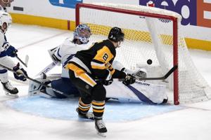 Penguins move into a playoff spot with 5-4 win over Lightning