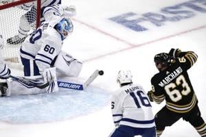 Knies scores in OT, Maple Leafs top Bruins 2-1 to stay alive without Matthews