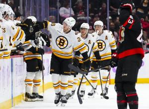 Stutzle scores two, Ottawa Senators down Bruins 5-3 to snap Boston's win streak