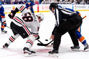 Bo Horvat and Simon Holmstrom rally the Islanders over the Blackhawks 2-1