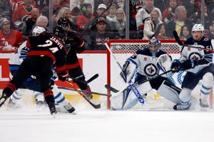 Jarvis scores a hat trick as Hurricanes pull away in third period to beat Jets 5-1