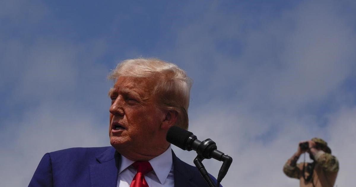 Trump uses a stretch of border wall and a pile of steel beams in Arizona to contrast with Democrats