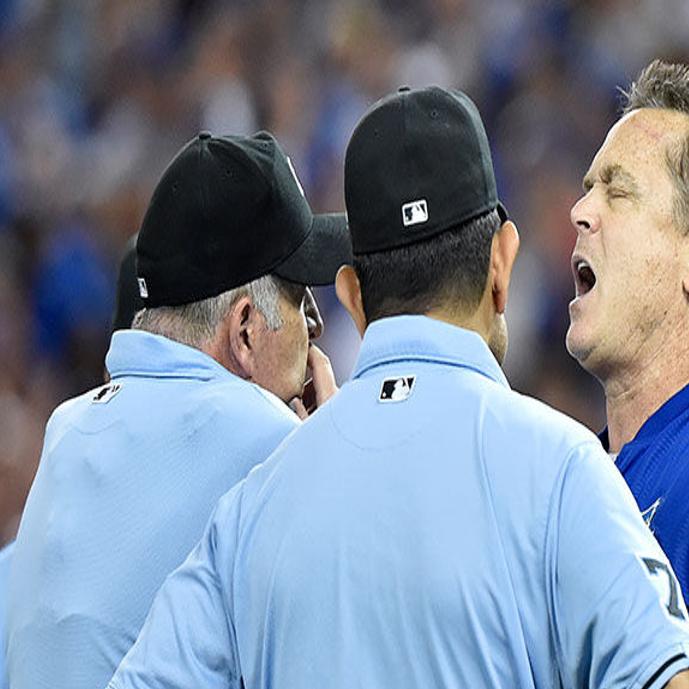 Blue Jays pitcher Marcus Stroman charges umpire, restrained by