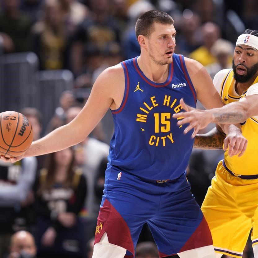 Jokic and the Nuggets receive rings, watch championship banner raised  before tipping off season - The San Diego Union-Tribune